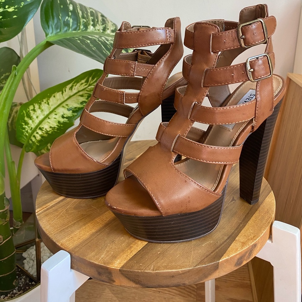 Brown platform Steve Madden heels.